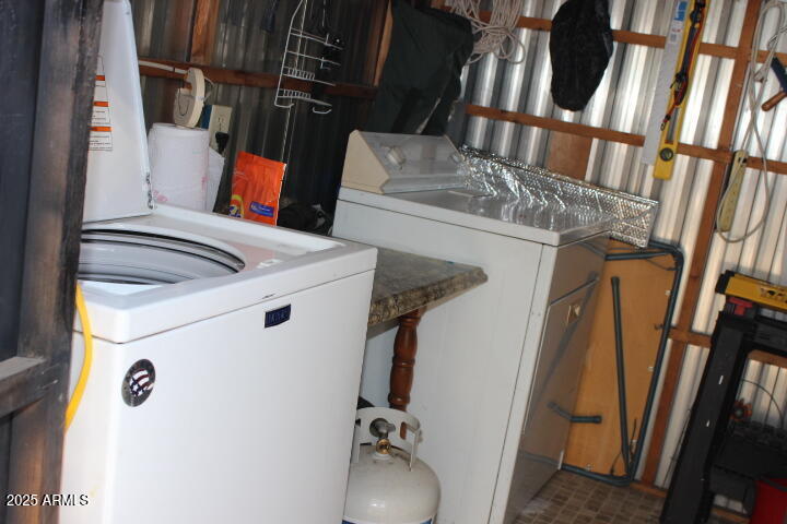 303 South Recker Road, Unit 223 Mesa, AZ 85206 - Photo 23 of 31 a utility room with dryer and washer