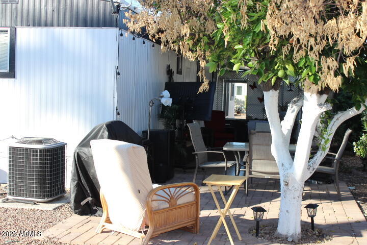 303 South Recker Road, Unit 223 Mesa, AZ 85206 - Photo 26 of 31 a front view of a house with chairs