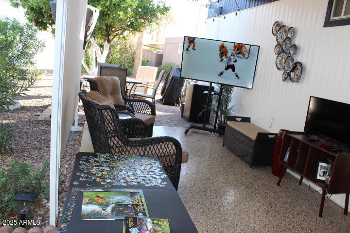 303 South Recker Road, Unit 223 Mesa, AZ 85206 - Photo 28 of 31 a view of a livingroom with furniture and a window