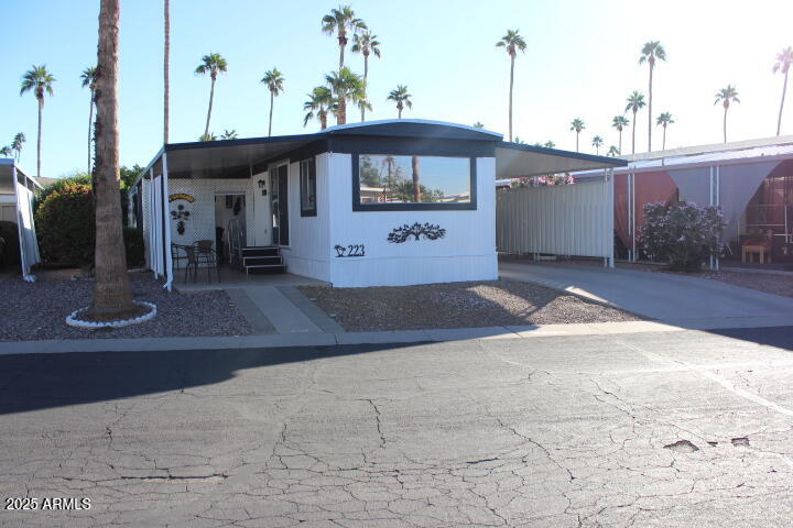 303 South Recker Road, Unit 223 Mesa, AZ 85206 - Photo 31 of 31 a view of a house with a park