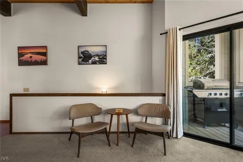 a workspace with furniture and a window