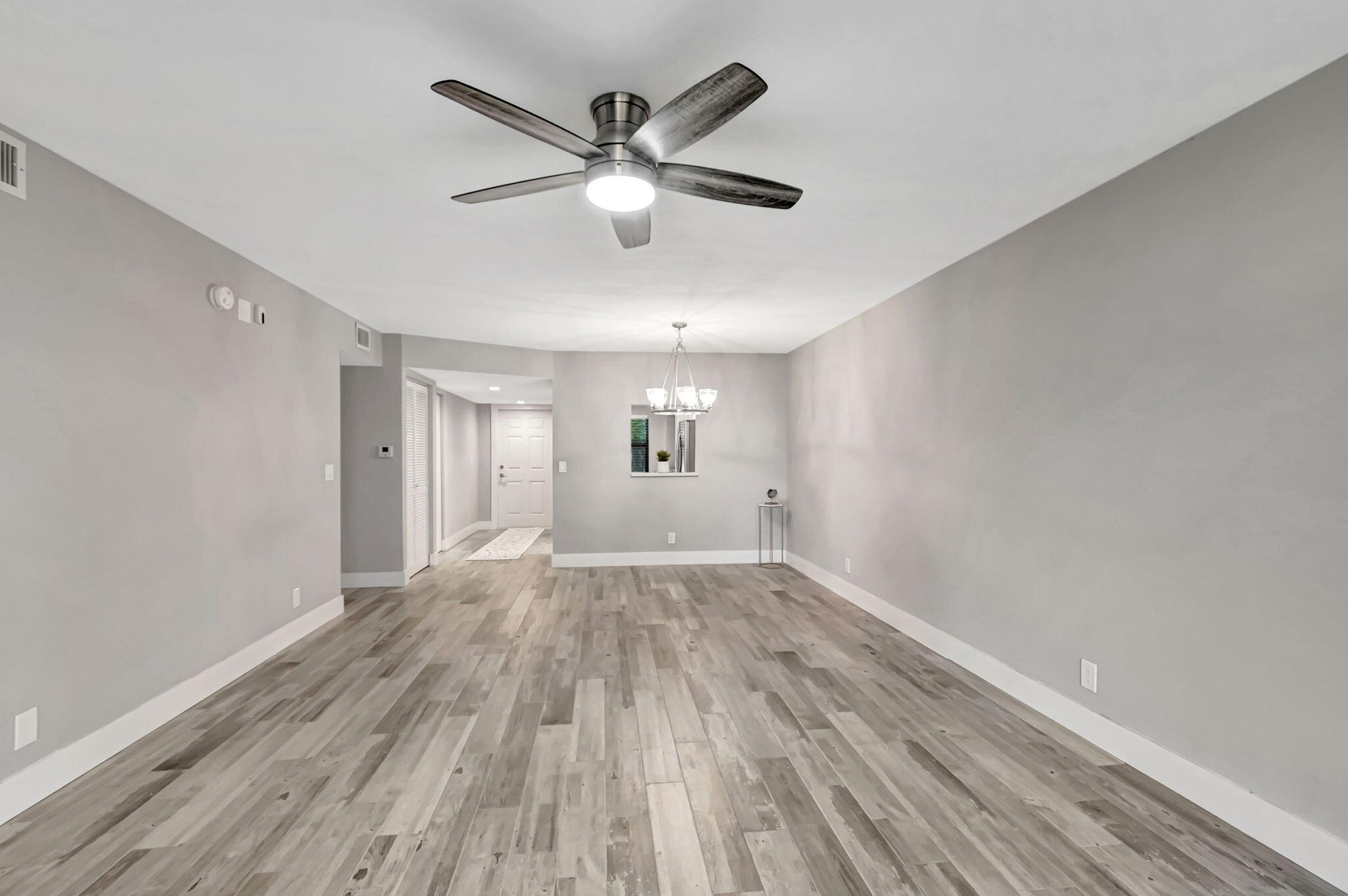 2890 Southwest 22nd Circle, Unit 241D Delray Beach, FL 33445 - Photo 11 of 34 Open Living and Dining Room