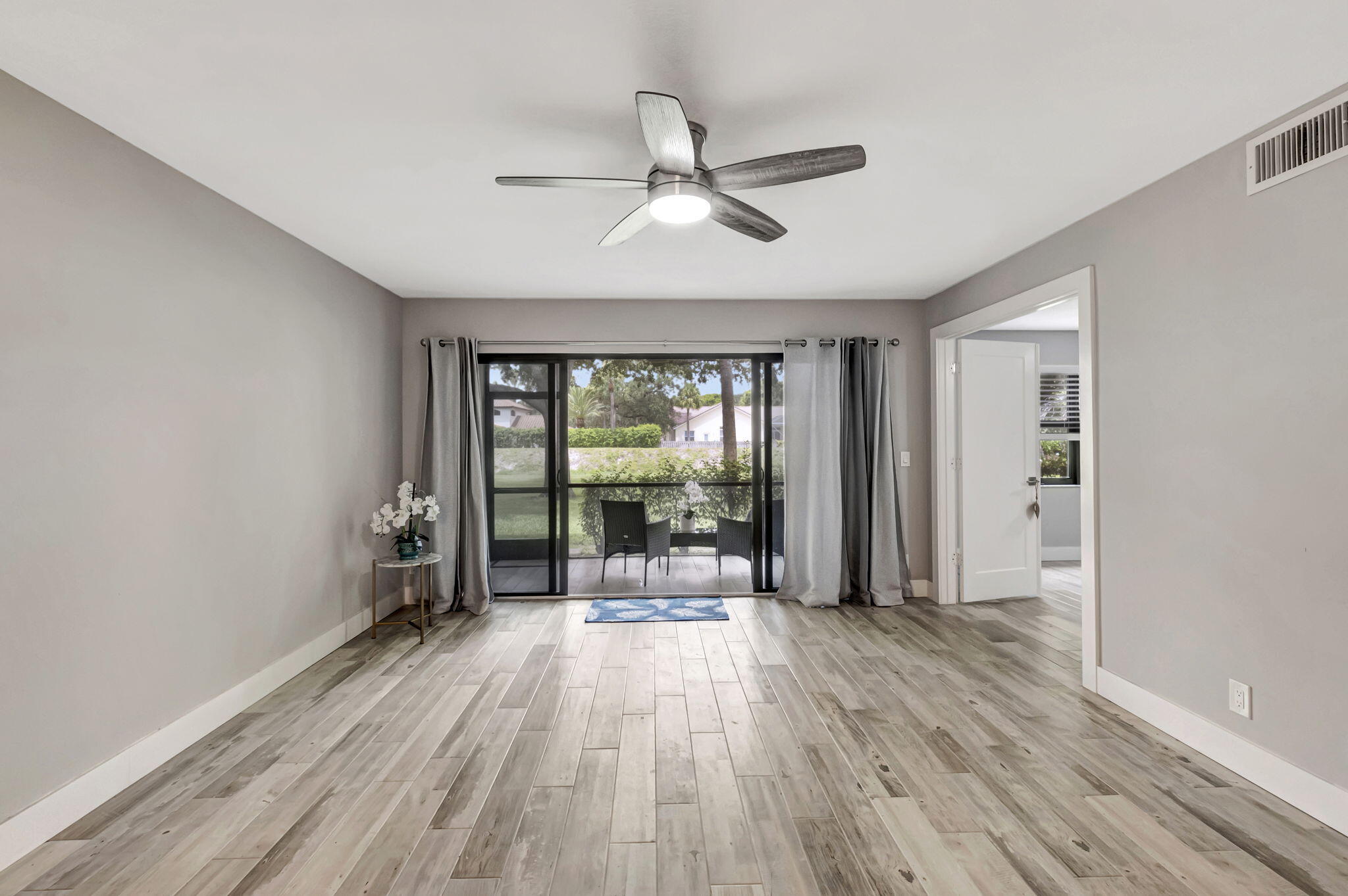 2890 Southwest 22nd Circle, Unit 241D Delray Beach, FL 33445 - Photo 13 of 34 Open Living and Dining Room