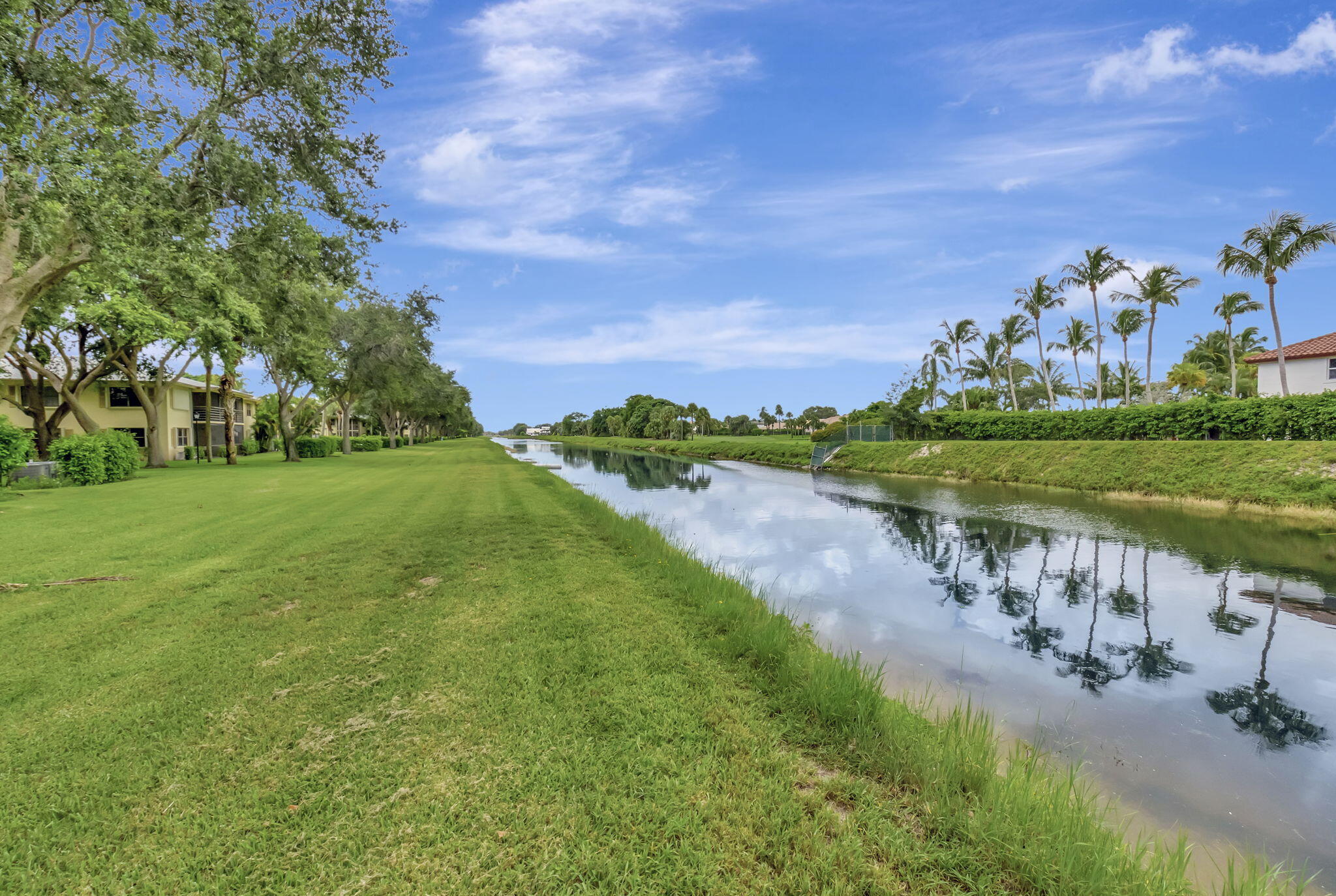 2890 Southwest 22nd Circle, Unit 241D Delray Beach, FL 33445 - Photo 28 of 34 Canal behind the home
