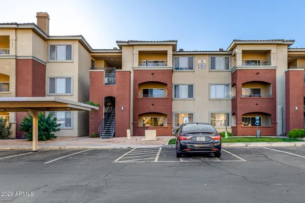 a car parked in front of a building