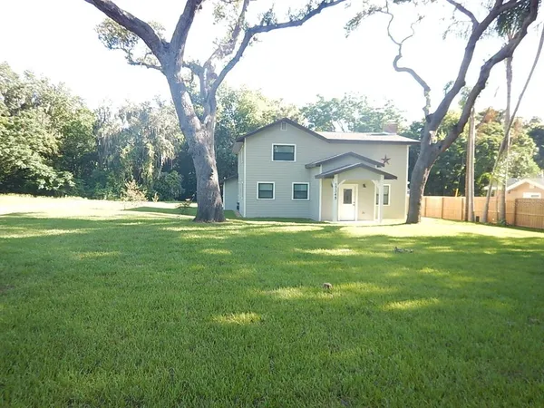 a house view with garden space