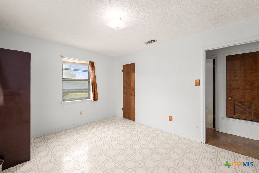 23168 Wolfridge Road Killeen, TX 76549 - Photo 20 of 42 a view of an empty room with a window