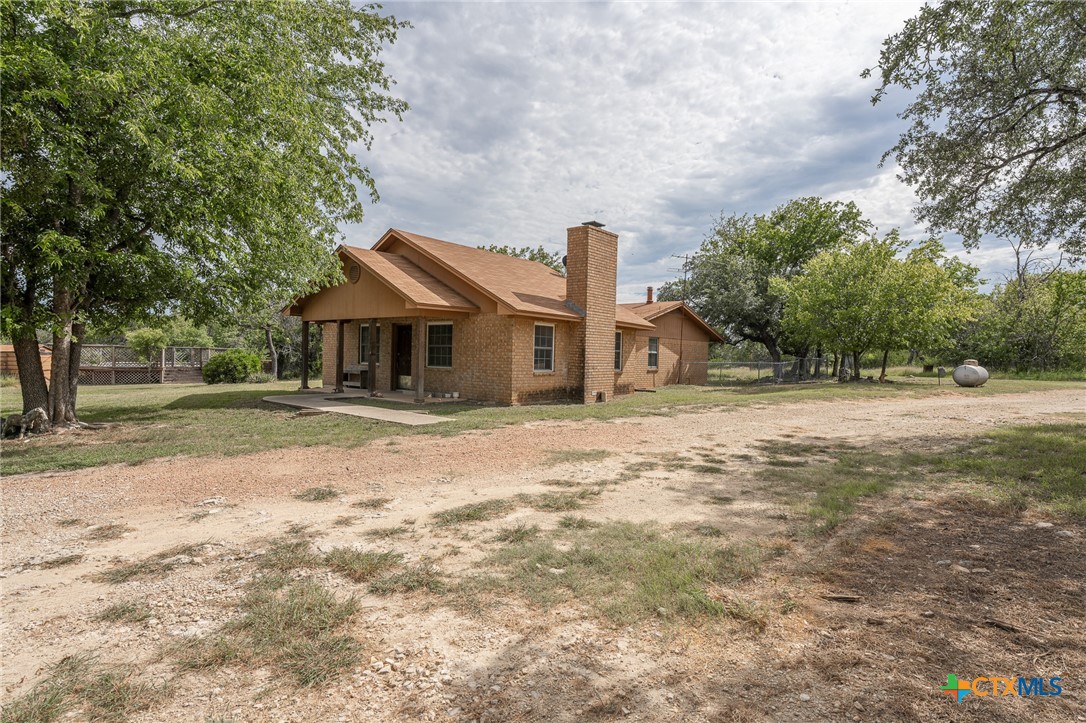 23168 Wolfridge Road Killeen, TX 76549 - Photo 2 of 42 a front view of a house with a yard