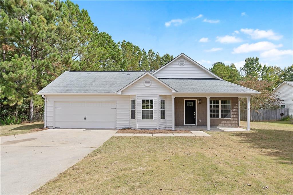 a house with trees in the background