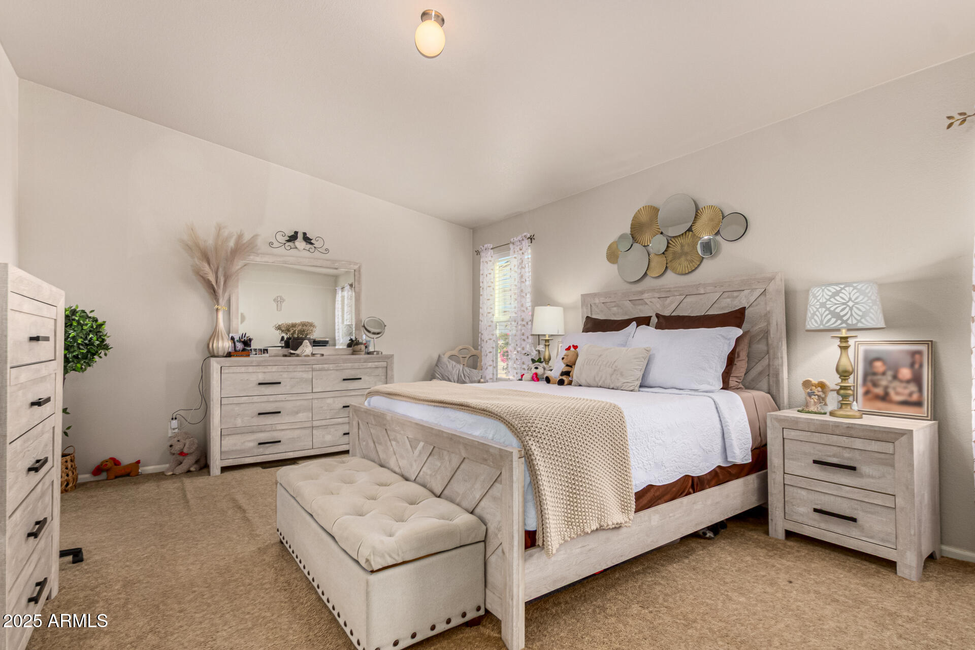 20514 West Narramore Road Buckeye, AZ 85326 - Photo 14 of 31 a bedroom with a bed and a couch