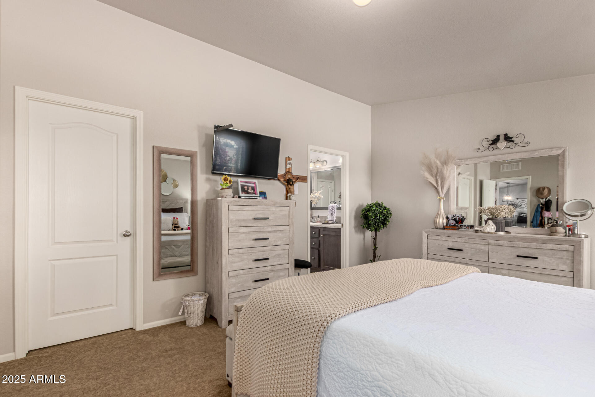 20514 West Narramore Road Buckeye, AZ 85326 - Photo 15 of 31 a bedroom with a bed and a television