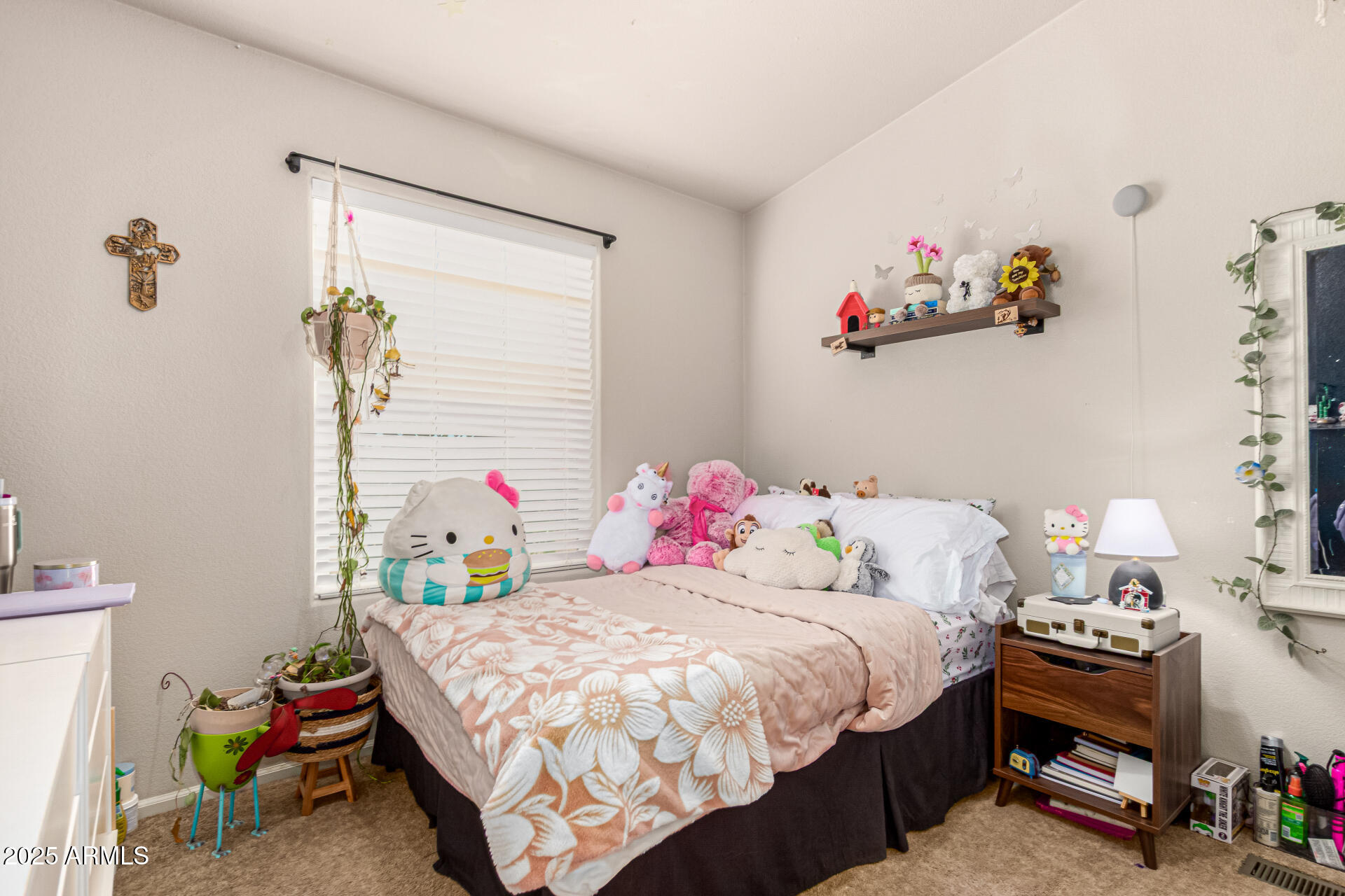 20514 West Narramore Road Buckeye, AZ 85326 - Photo 20 of 31 a bedroom with a bed and a window