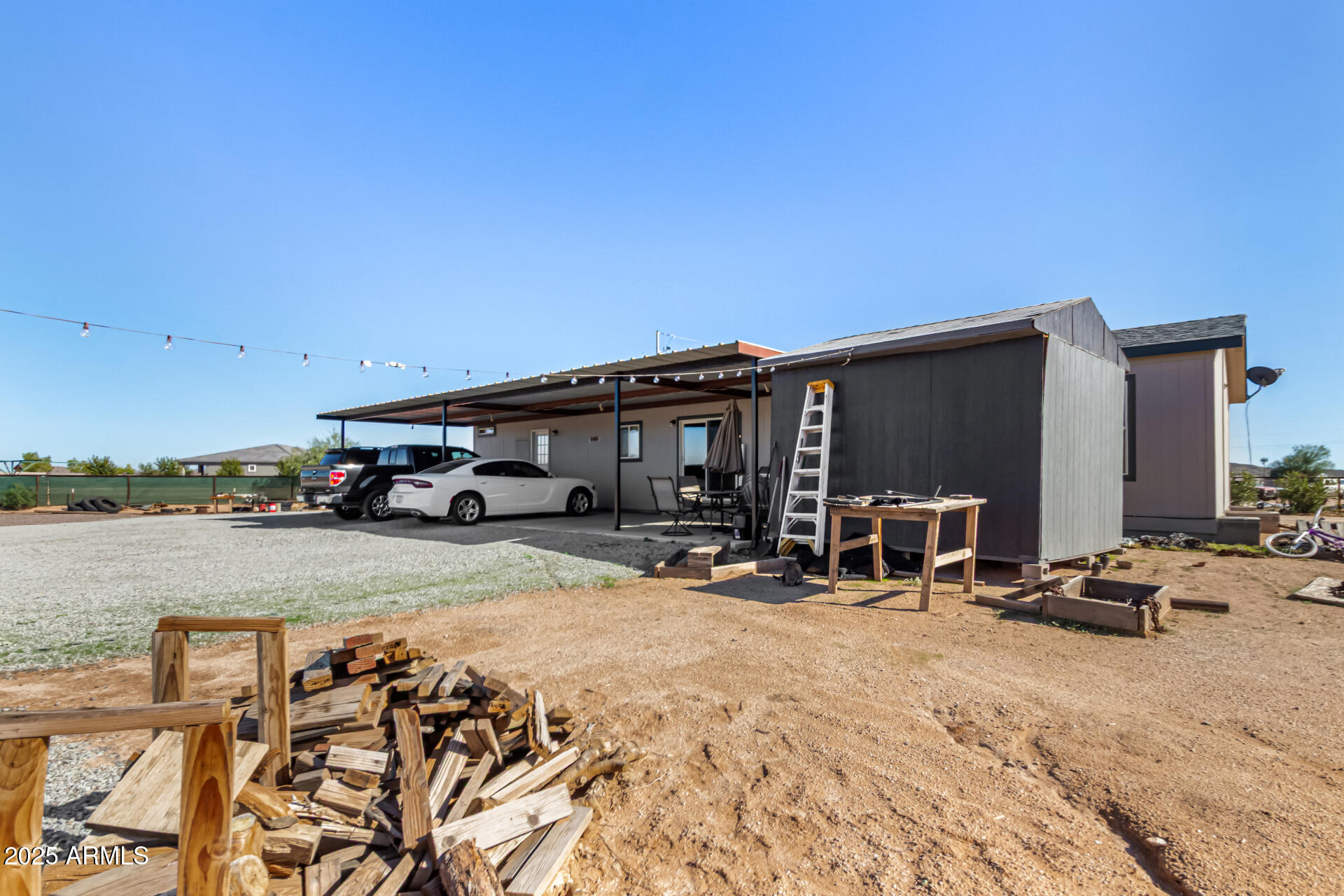 20514 West Narramore Road Buckeye, AZ 85326 - Photo 27 of 31 a view of a car park in front of house