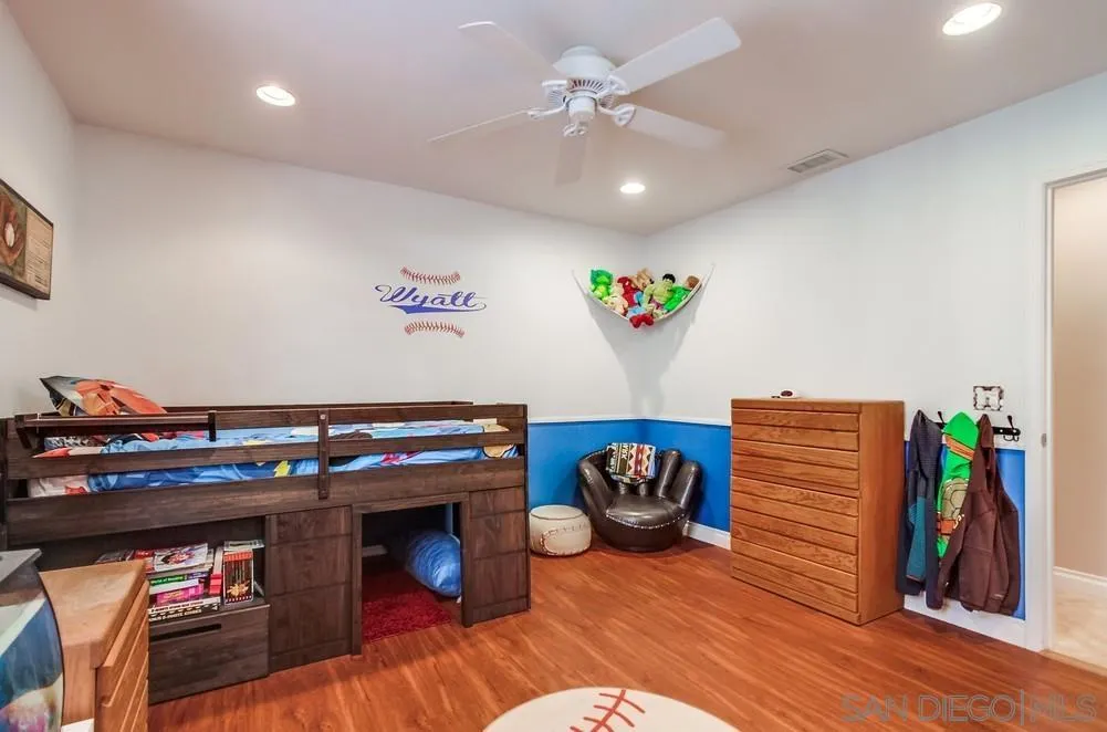 14020 Frame Road Poway, CA 92064 - Photo 24 of 52 a living room with furniture and a fireplace