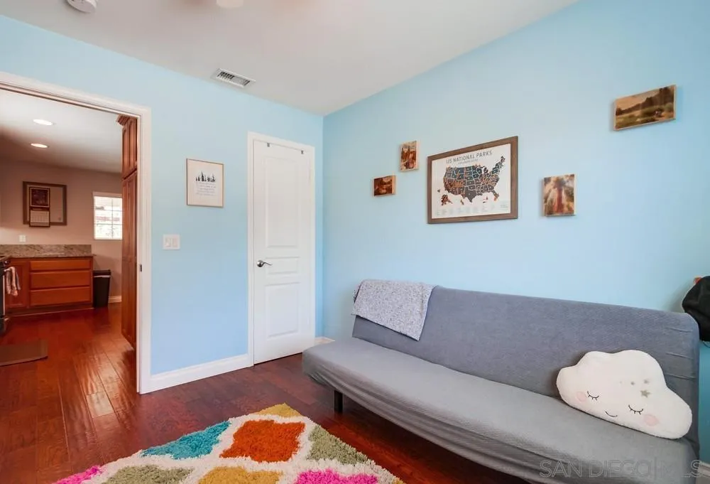 14020 Frame Road Poway, CA 92064 - Photo 26 of 52 a living room with furniture and a couch