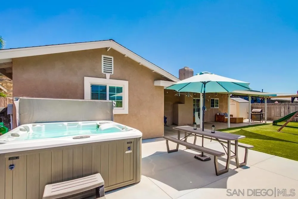 14020 Frame Road Poway, CA 92064 - Photo 33 of 52 a backyard of a house with table and chairs