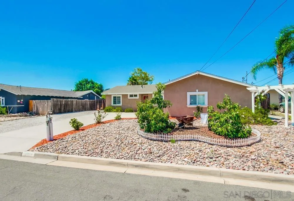 14020 Frame Road Poway, CA 92064 - Photo 43 of 52 a front view of a house with a yard