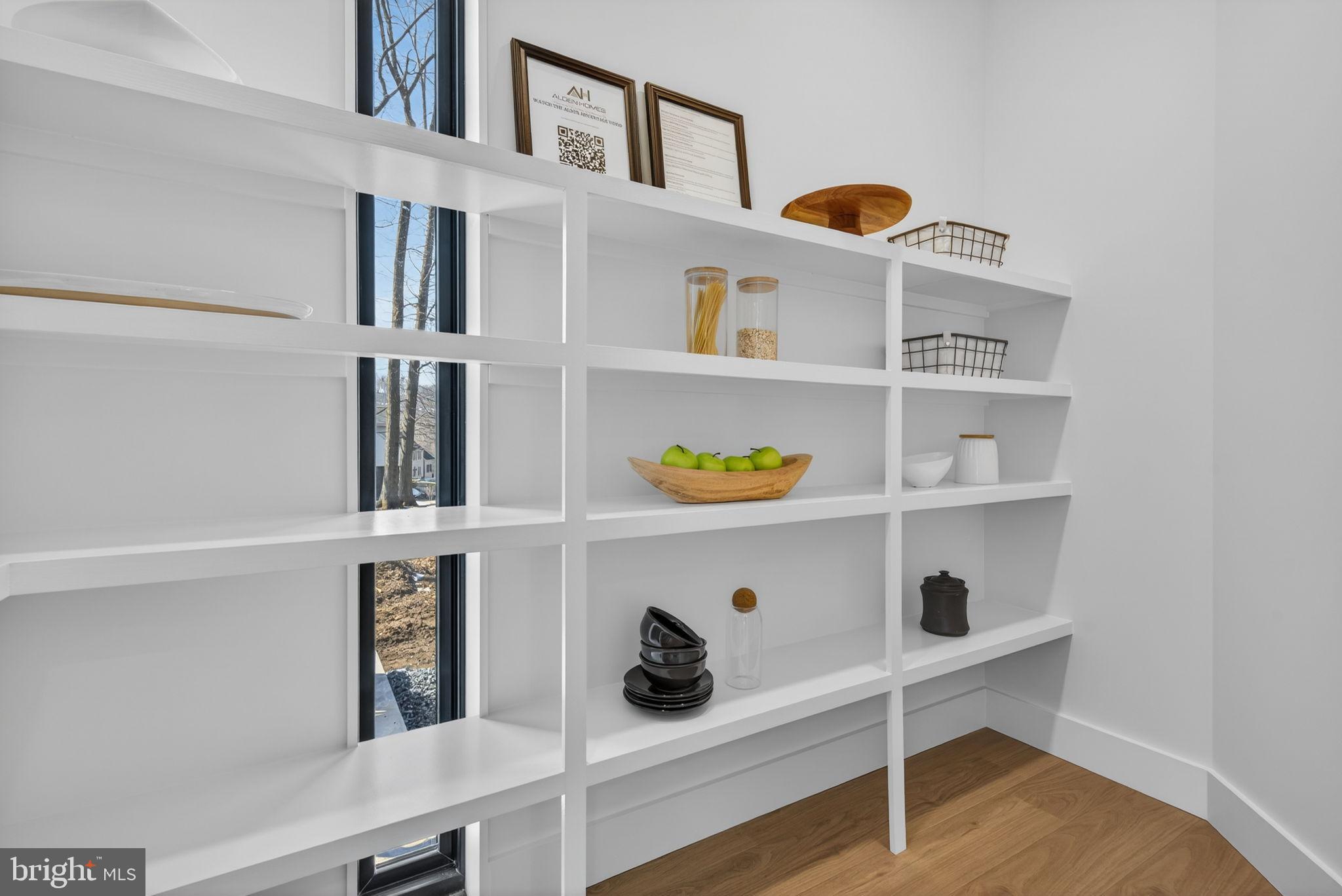 Anvil Model Lot #9 Anvil Model, Unit 9 Womelsdorf, PA 19567 - Photo 35 of 68 Sleek shelving in a bright, modern space.