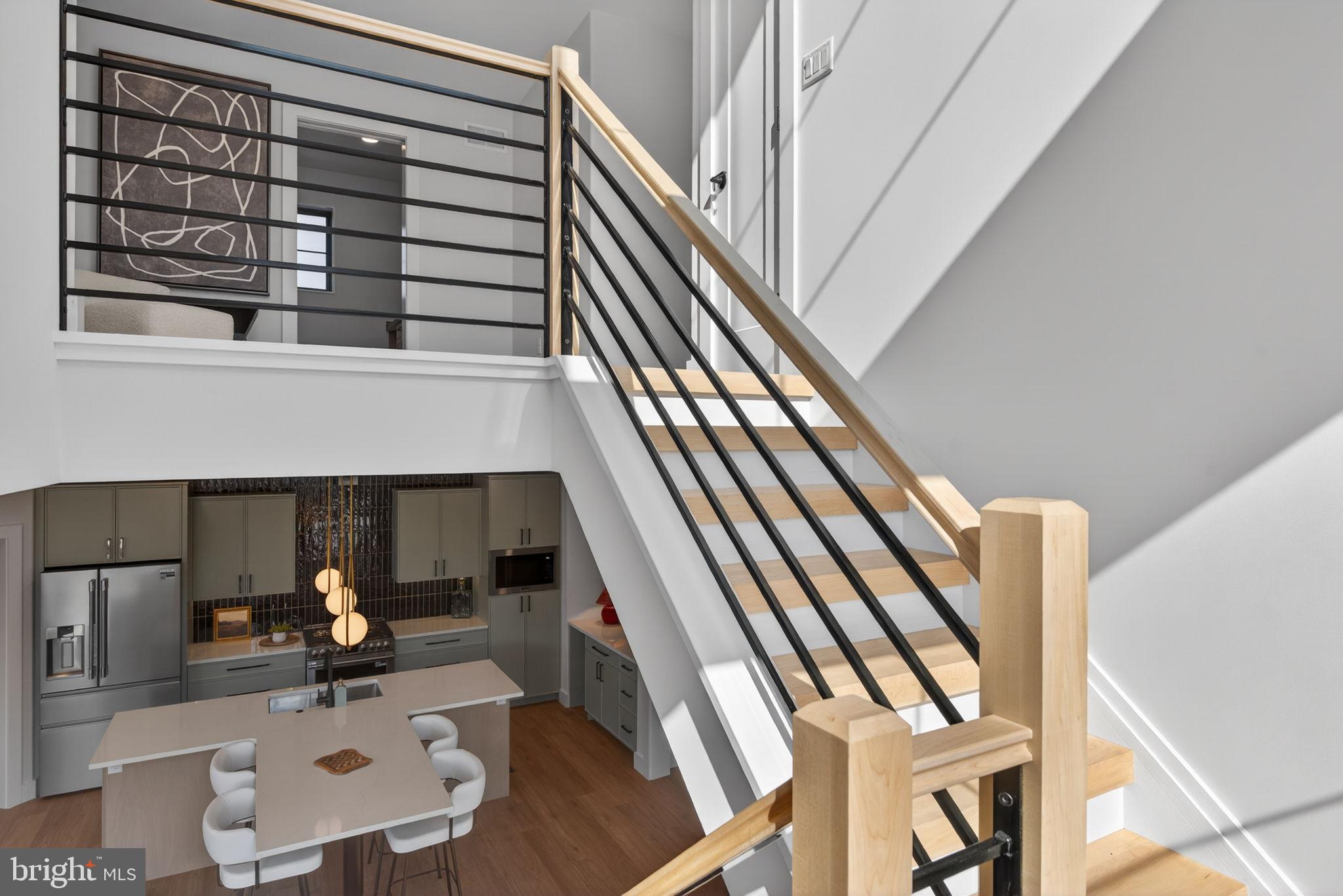 Anvil Model Lot #9 Anvil Model, Unit 9 Womelsdorf, PA 19567 - Photo 41 of 68 Modern staircase with sleek design elements.