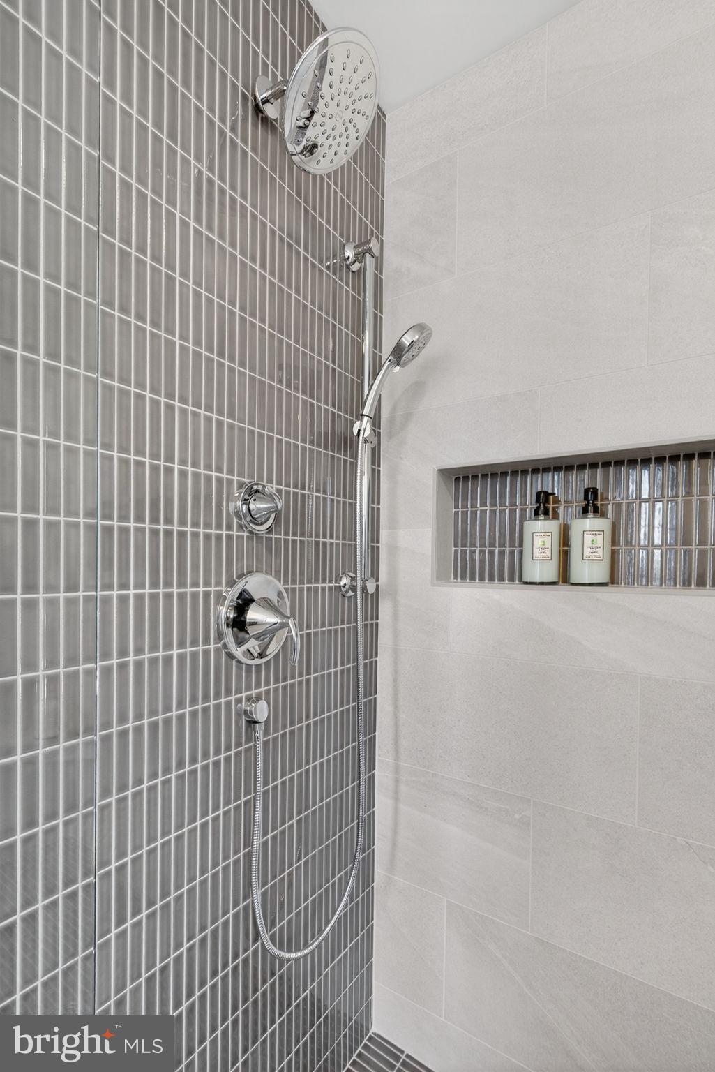Anvil Model Lot #9 Anvil Model, Unit 9 Womelsdorf, PA 19567 - Photo 51 of 68 Sleek modern shower with elegant tiles.