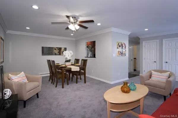 a dining room with furniture and a table