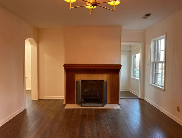 a living room with a fireplace