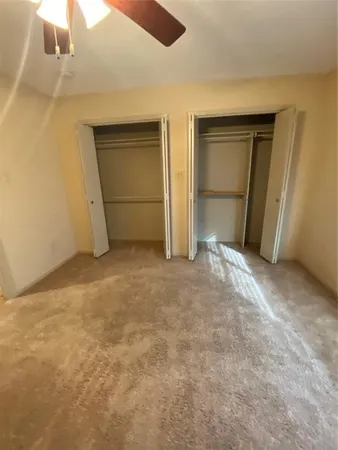 an empty room with closet