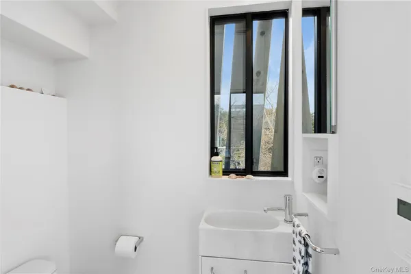 a bathroom with a bathtub and a sink