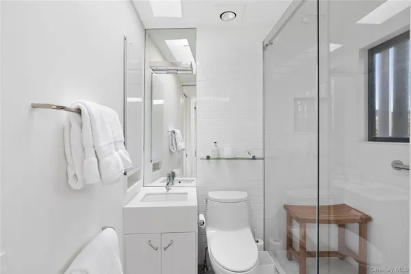 a bathroom with a toilet a sink and a bathtub