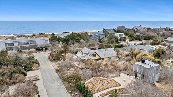 a view of large house with a yard