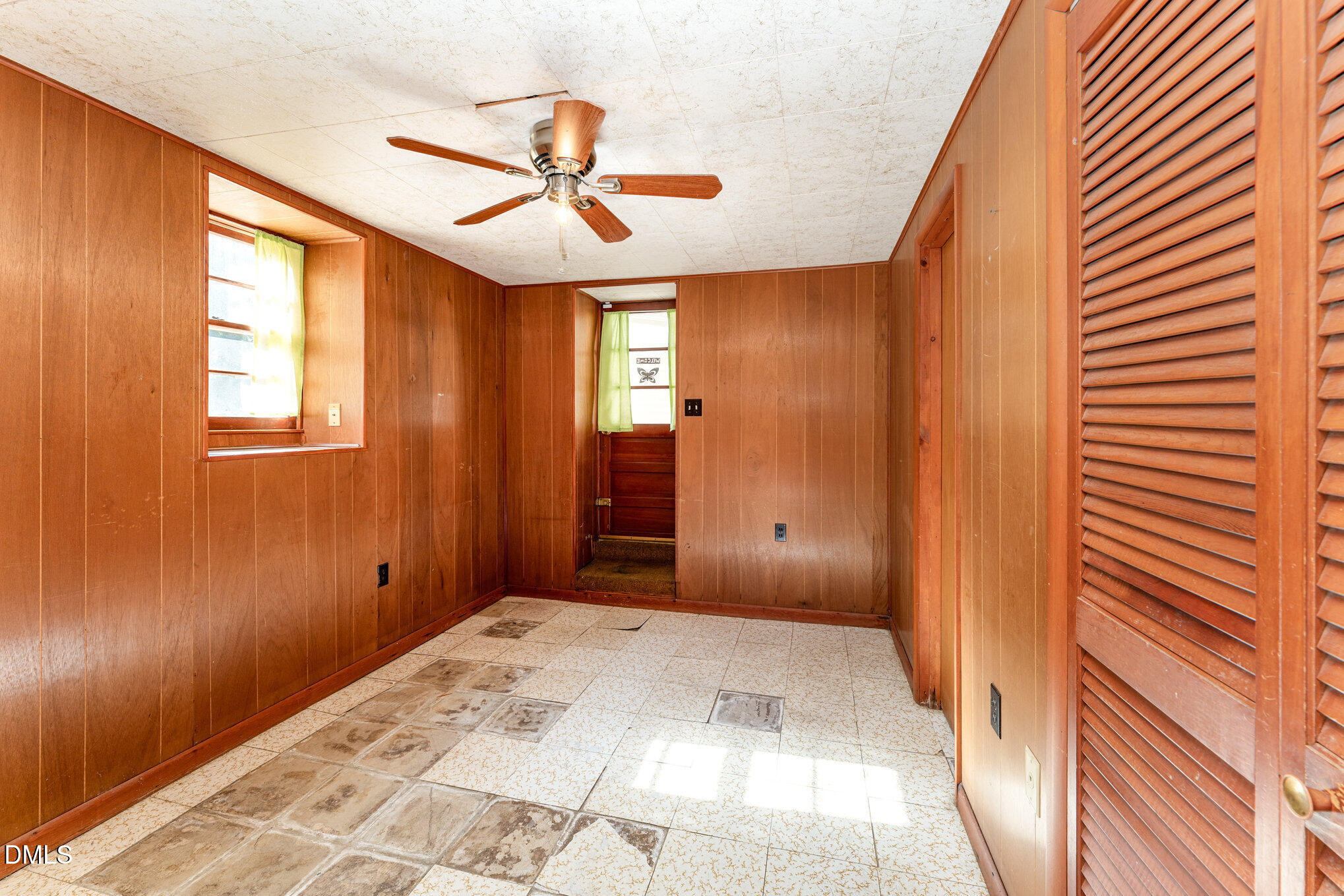 120 Blanchard Street Raleigh, NC 27603 - Photo 15 of 23 a view of a hallway with a chandelier fan