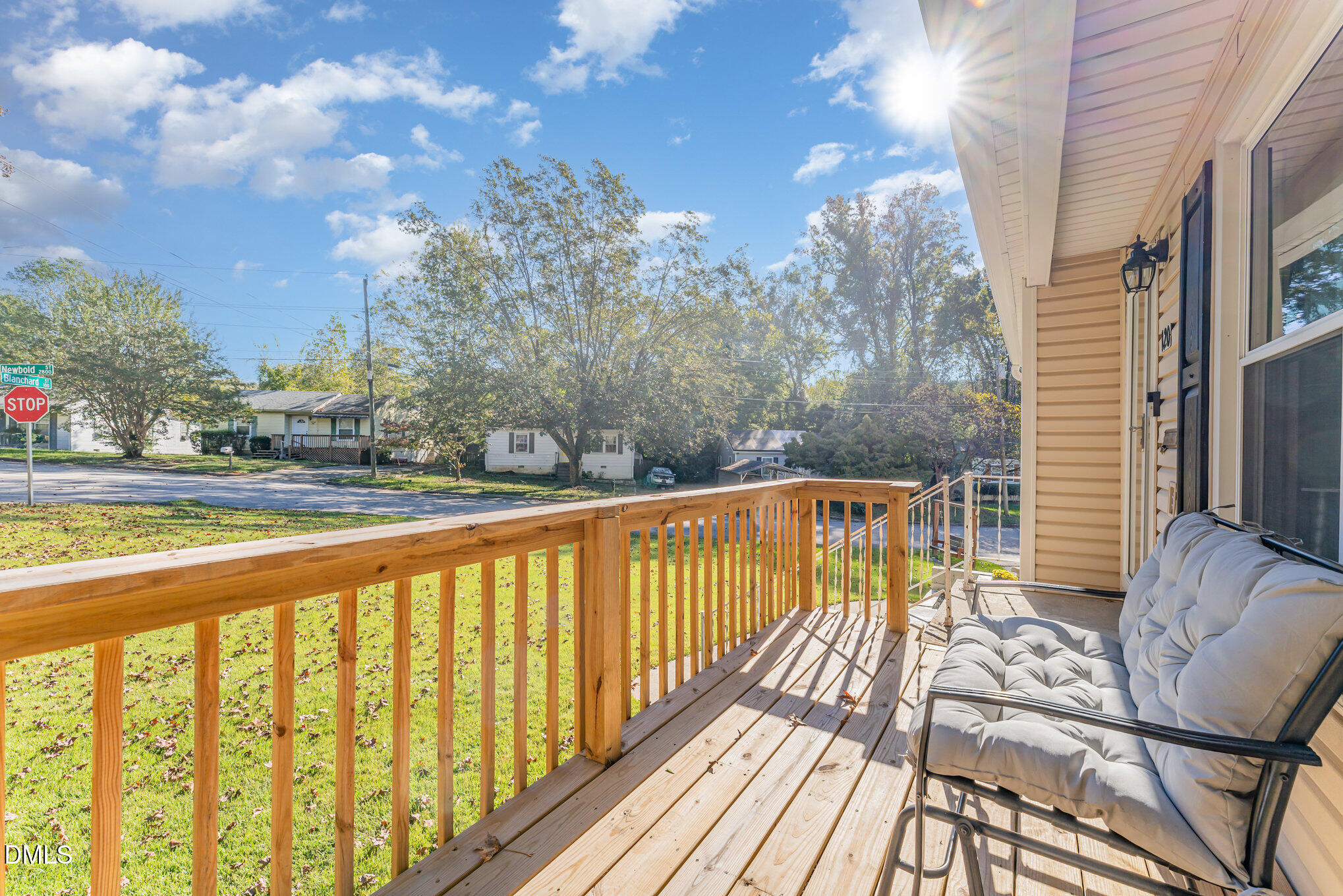 120 Blanchard Street Raleigh, NC 27603 - Photo 20 of 23 a view of balcony with wooden floor and fence