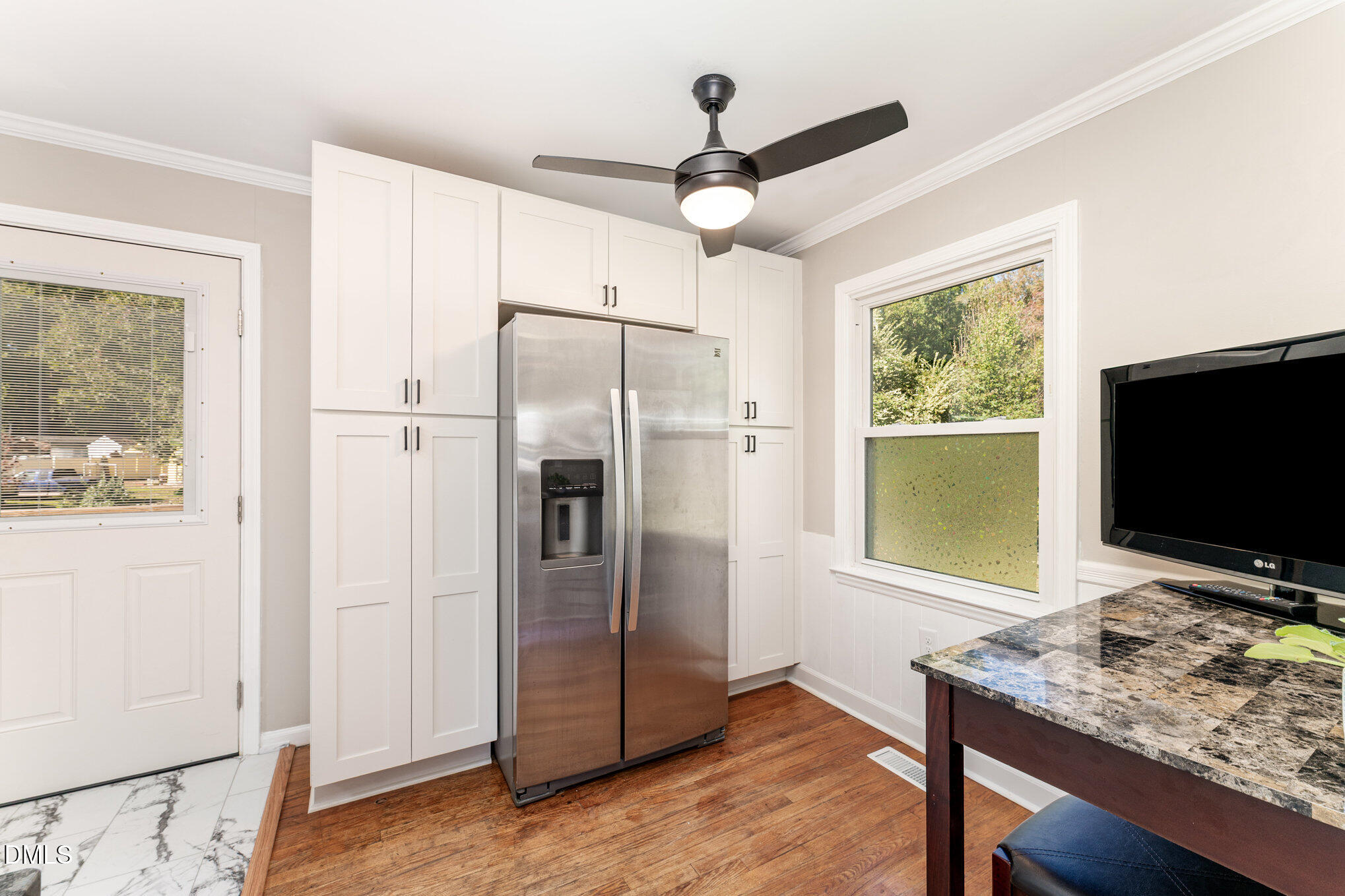 120 Blanchard Street Raleigh, NC 27603 - Photo 8 of 23 a view of a workspace with furniture and a window