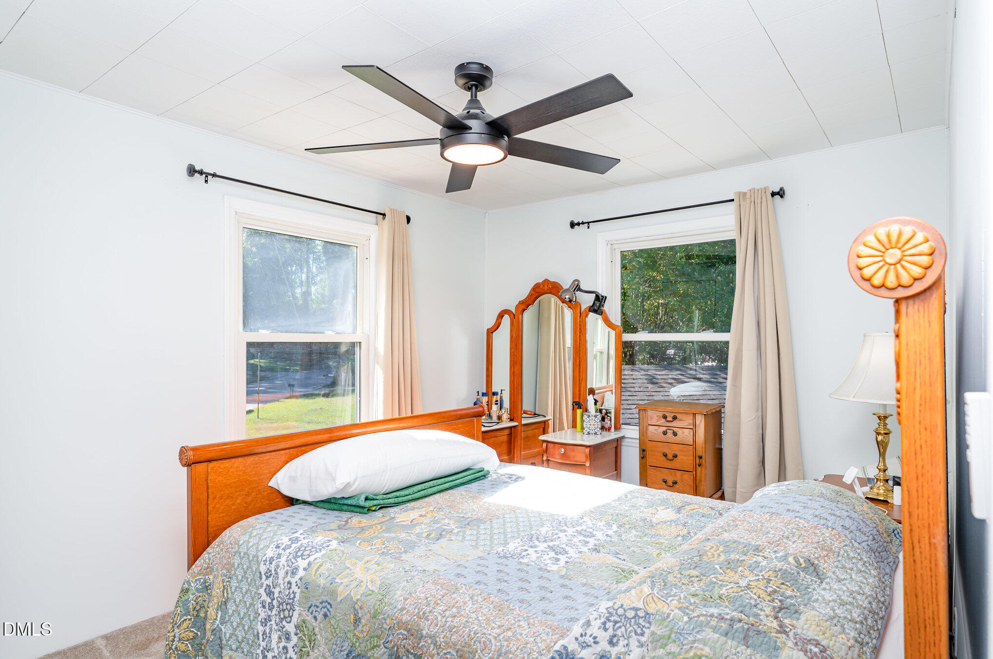 120 Blanchard Street Raleigh, NC 27603 - Photo 9 of 23 a bedroom with a bed and a large window