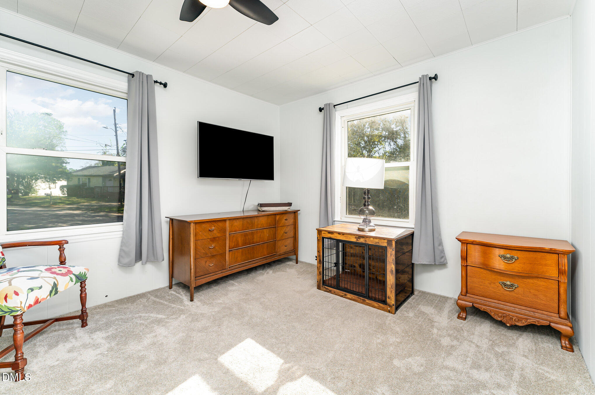 120 Blanchard Street Raleigh, NC 27603 - Photo 10 of 23 a living room with furniture and a flat screen tv