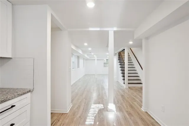 a view of entryway with wooden floor