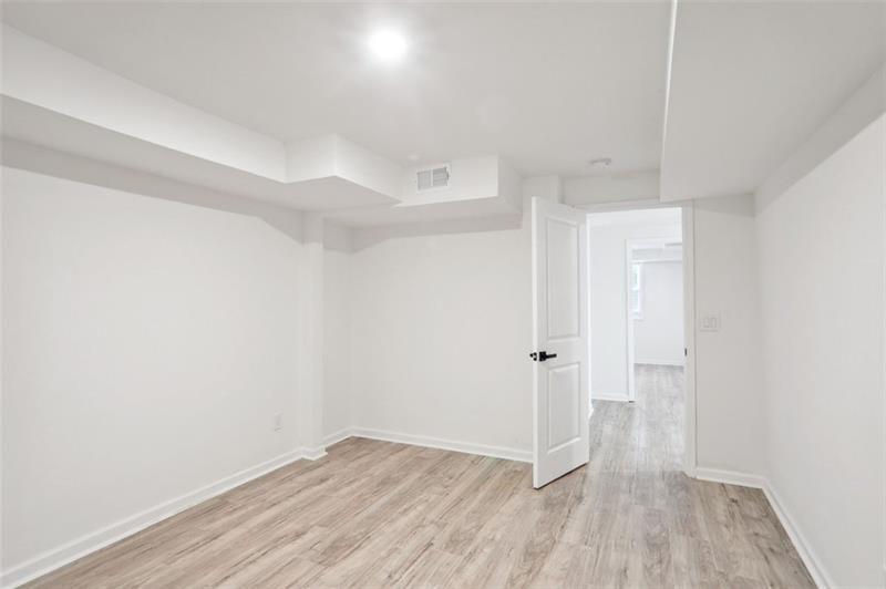 2533 Kelly Lake Road Decatur, GA 30032 - Photo 10 of 14 a view of a room with wooden floor