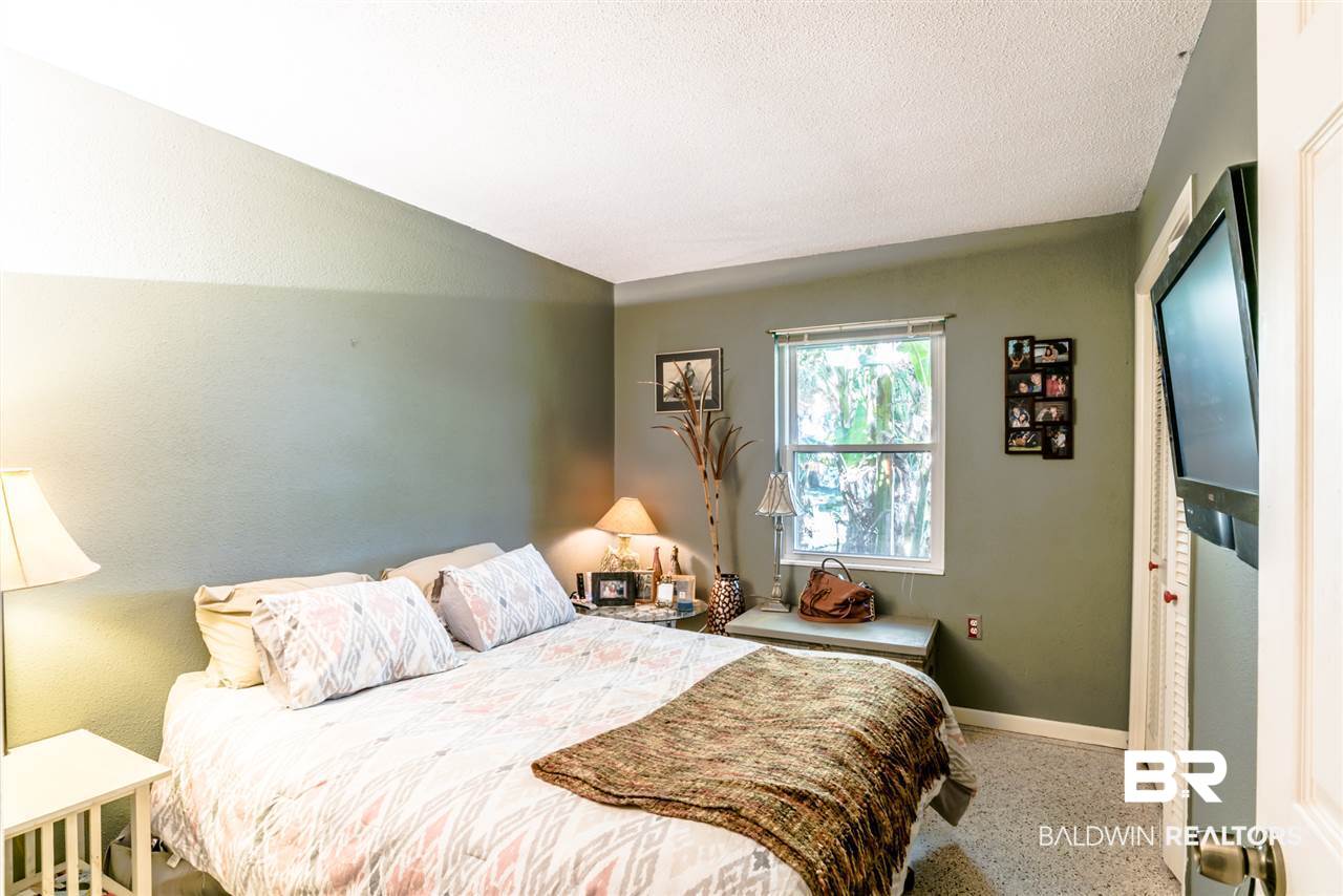 12967 West Fort Morgan Road Gulf Shores, AL 36542 - Photo 11 of 19 Master bedroom