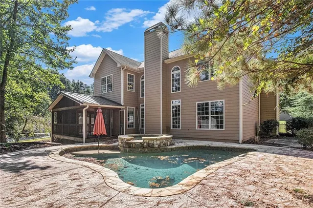 a front view of a house with yard