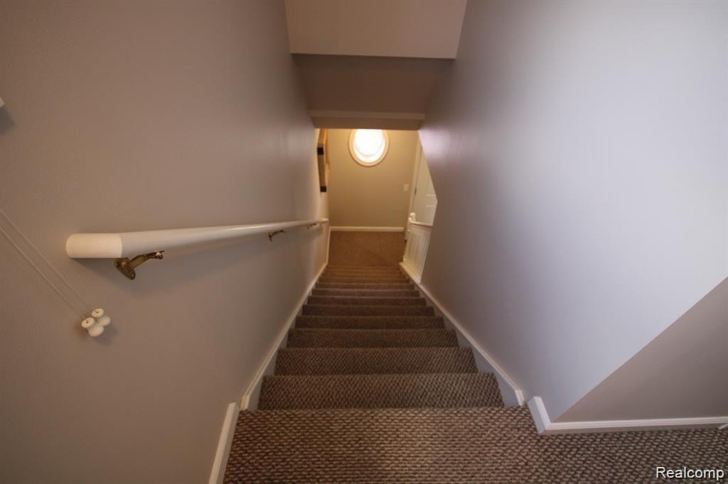 468 West 14 Mile Road Clawson, MI 48017 - Photo 8 of 24 Stairs to second level.