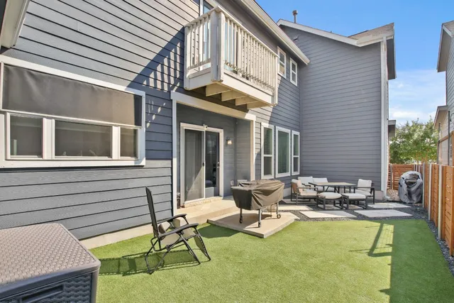 a view of swimming pool with outdoor seating