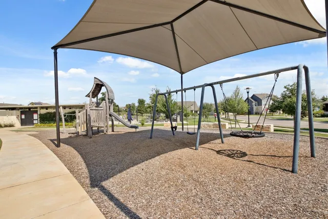 a view of a swimming pool with a porch