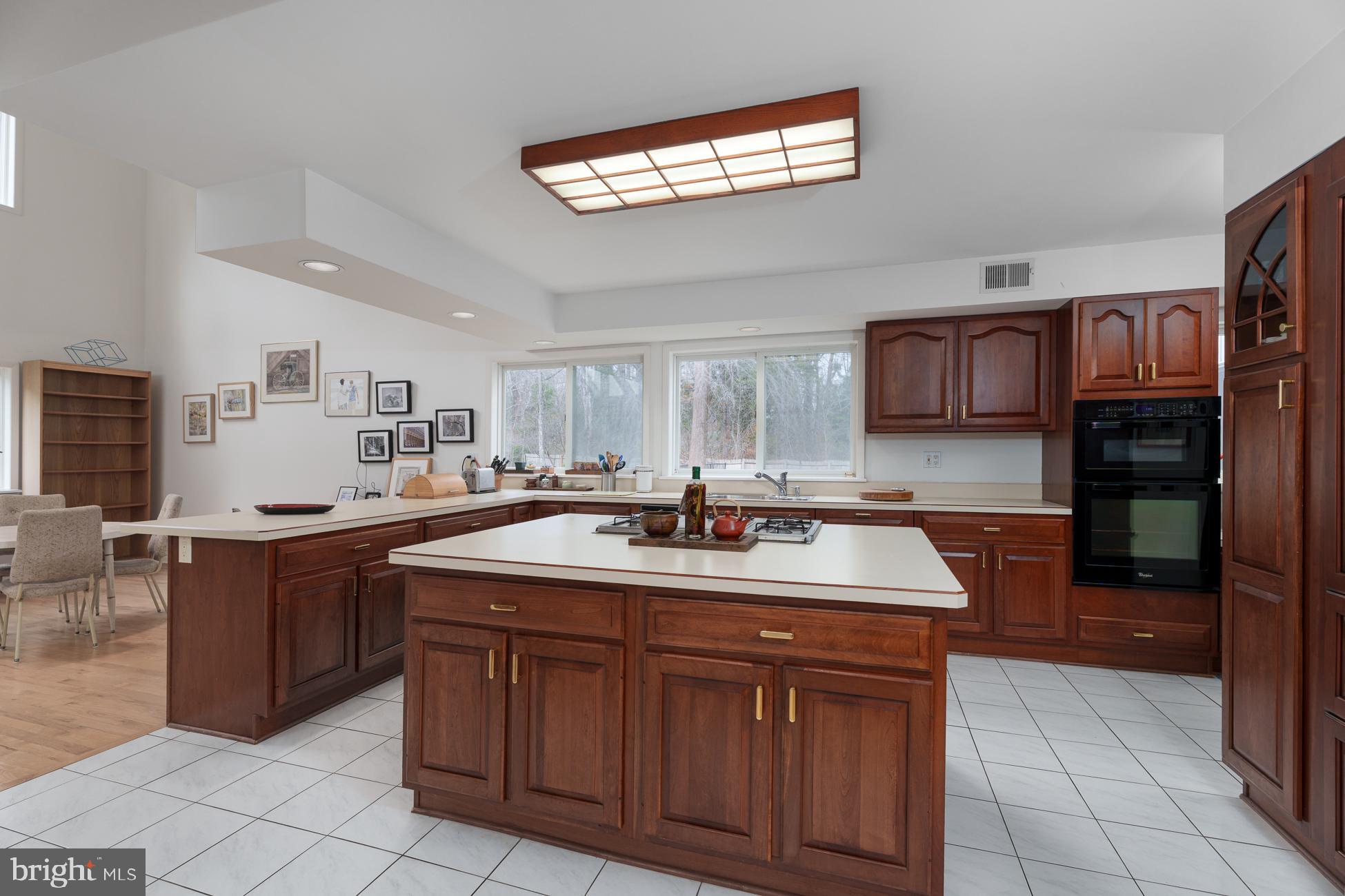 516 Mt Lucas Road Princeton, NJ 08540 - Photo 11 of 43 a kitchen with stainless steel appliances granite countertop a sink and cabinets