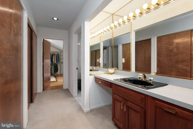 a bathroom with a bathtub and a sink