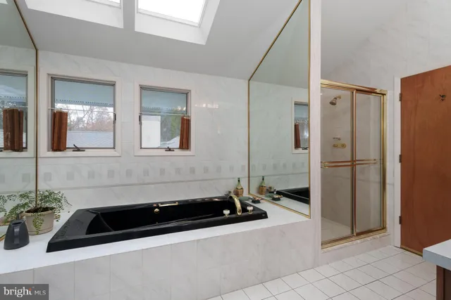 a kitchen with a sink and a refrigerator