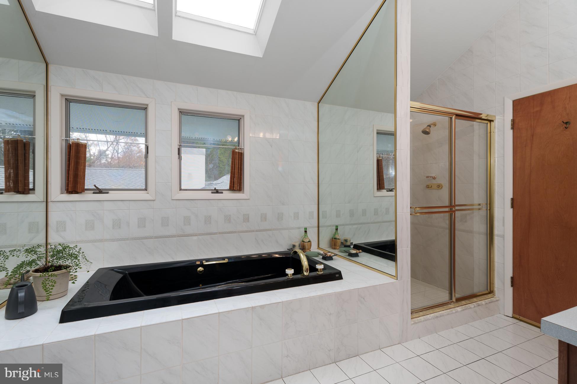 516 Mt Lucas Road Princeton, NJ 08540 - Photo 21 of 43 a bathroom with a bathtub and a sink