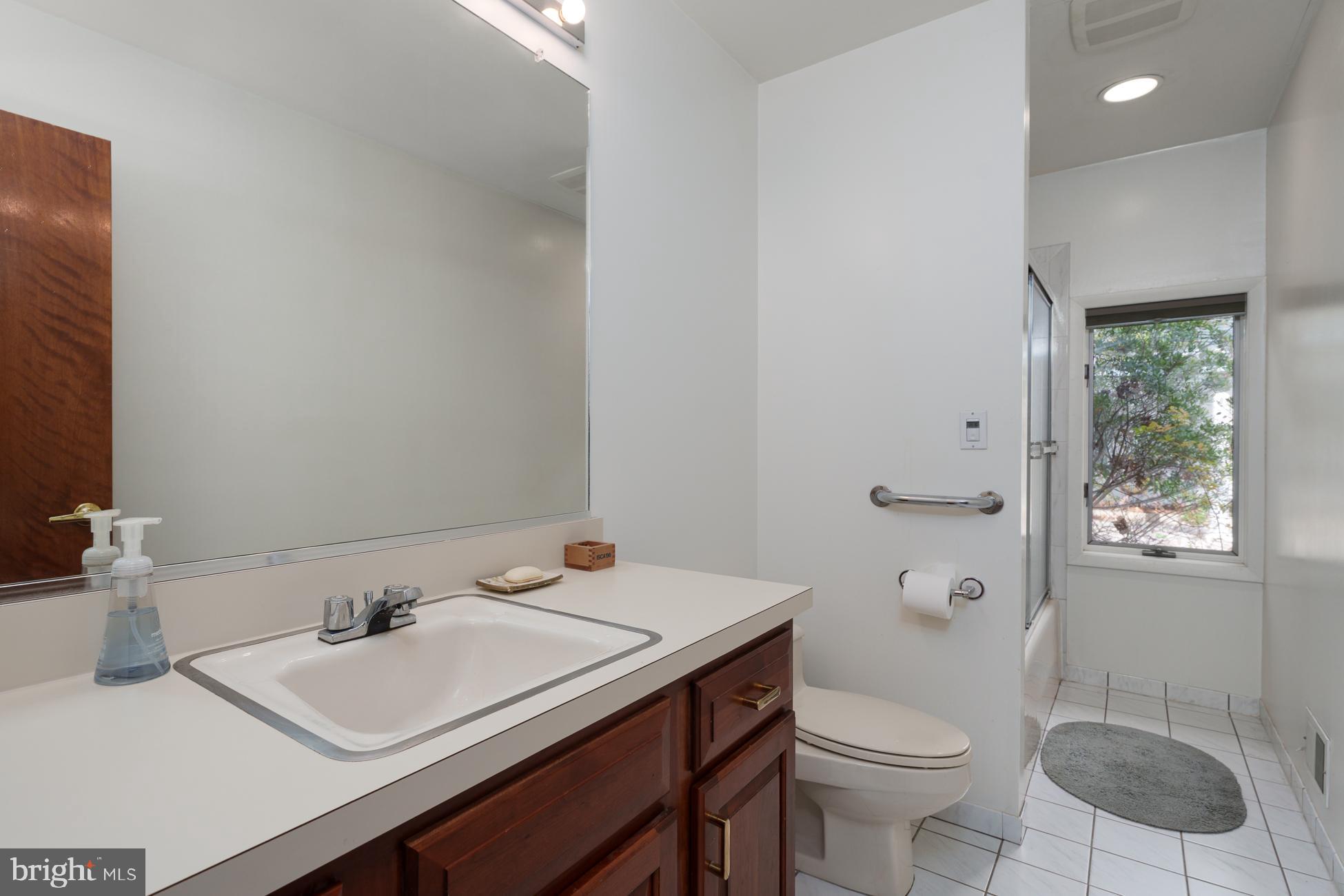 516 Mt Lucas Road Princeton, NJ 08540 - Photo 27 of 43 a bathroom with a sink toilet vanity and tub