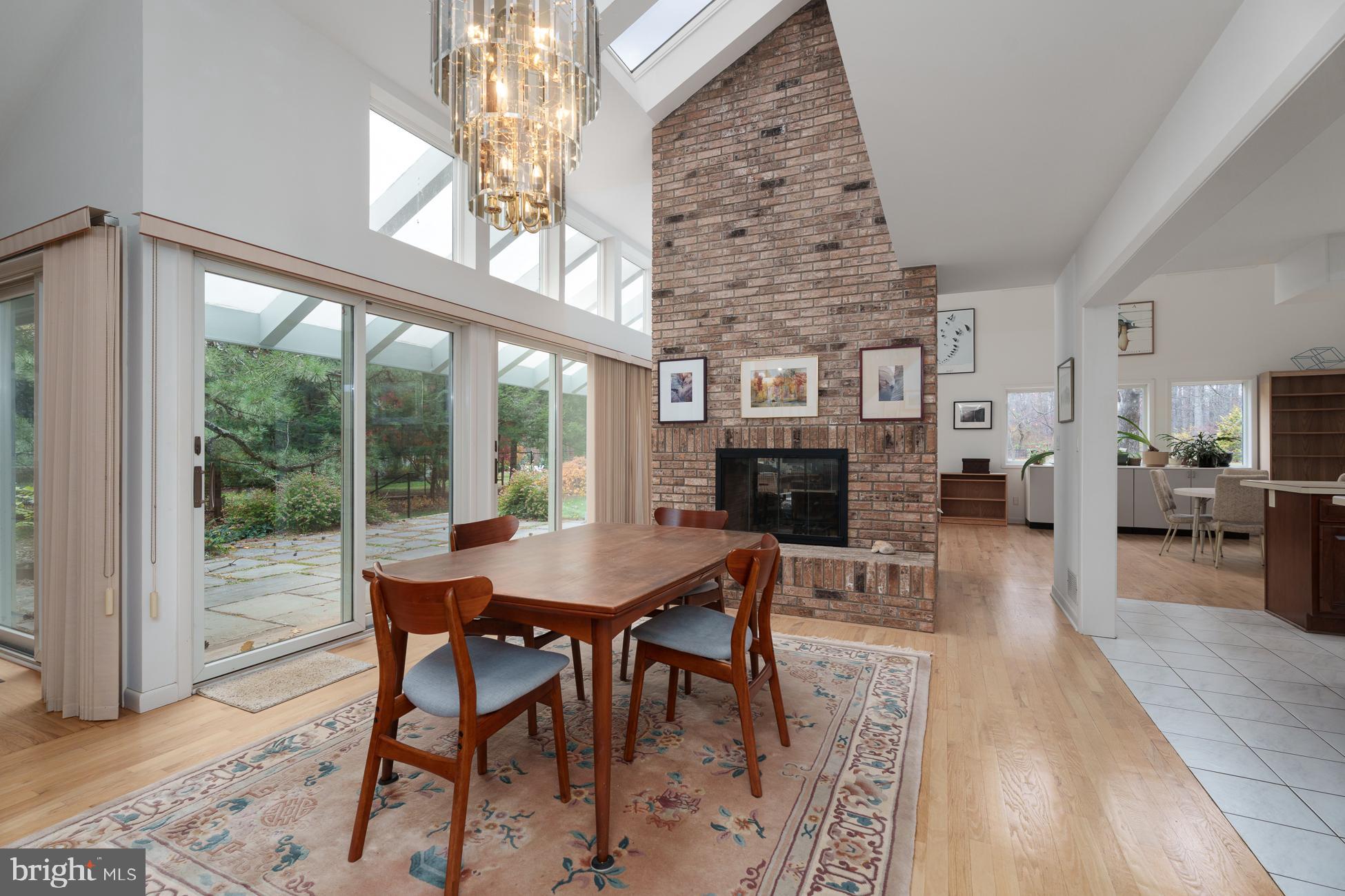 516 Mt Lucas Road Princeton, NJ 08540 - Photo 9 of 43 a view of a dining room with furniture window and wooden floor