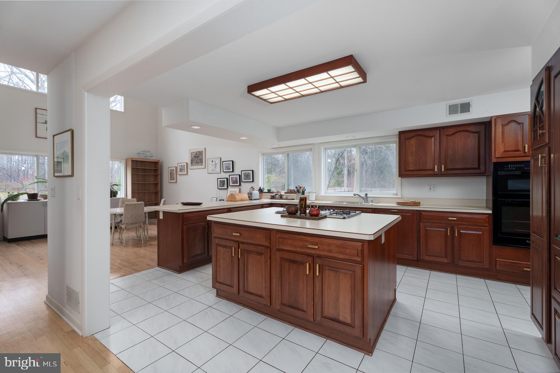 516 Mt Lucas Road Princeton, NJ 08540 - Photo 10 of 43 a kitchen with cabinets a sink and appliances