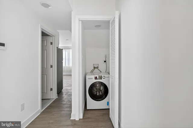 a utility room with dryer and washer